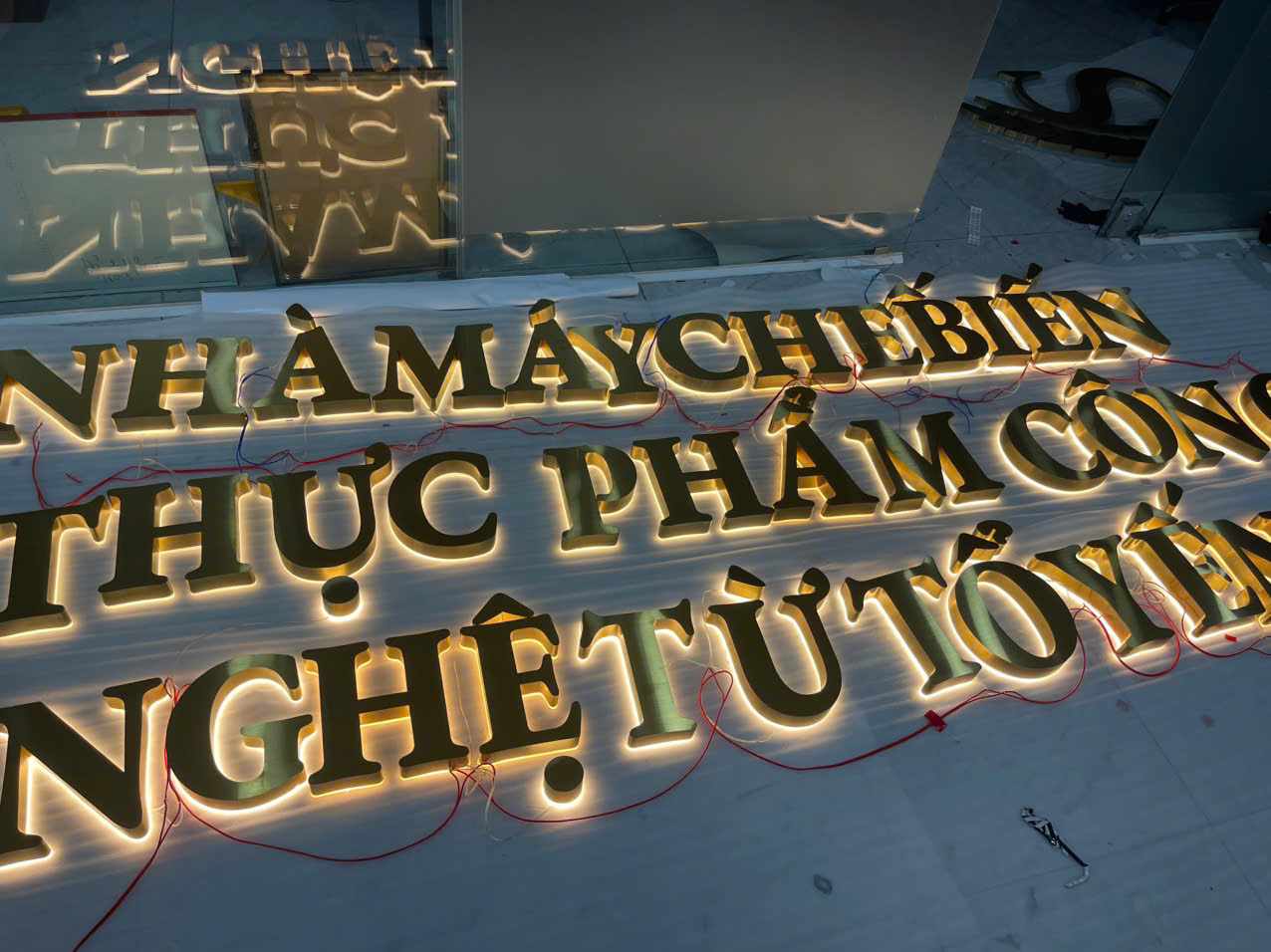 chu inox vang xuoc nha trang